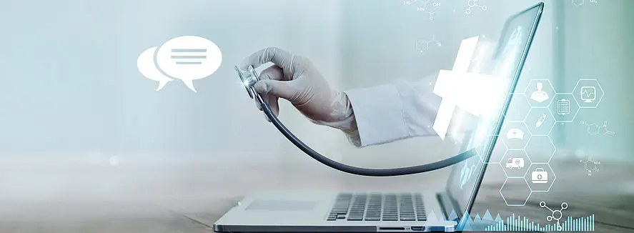 Ein abstraktes Bild mit einem PC und einem Stetoskop.